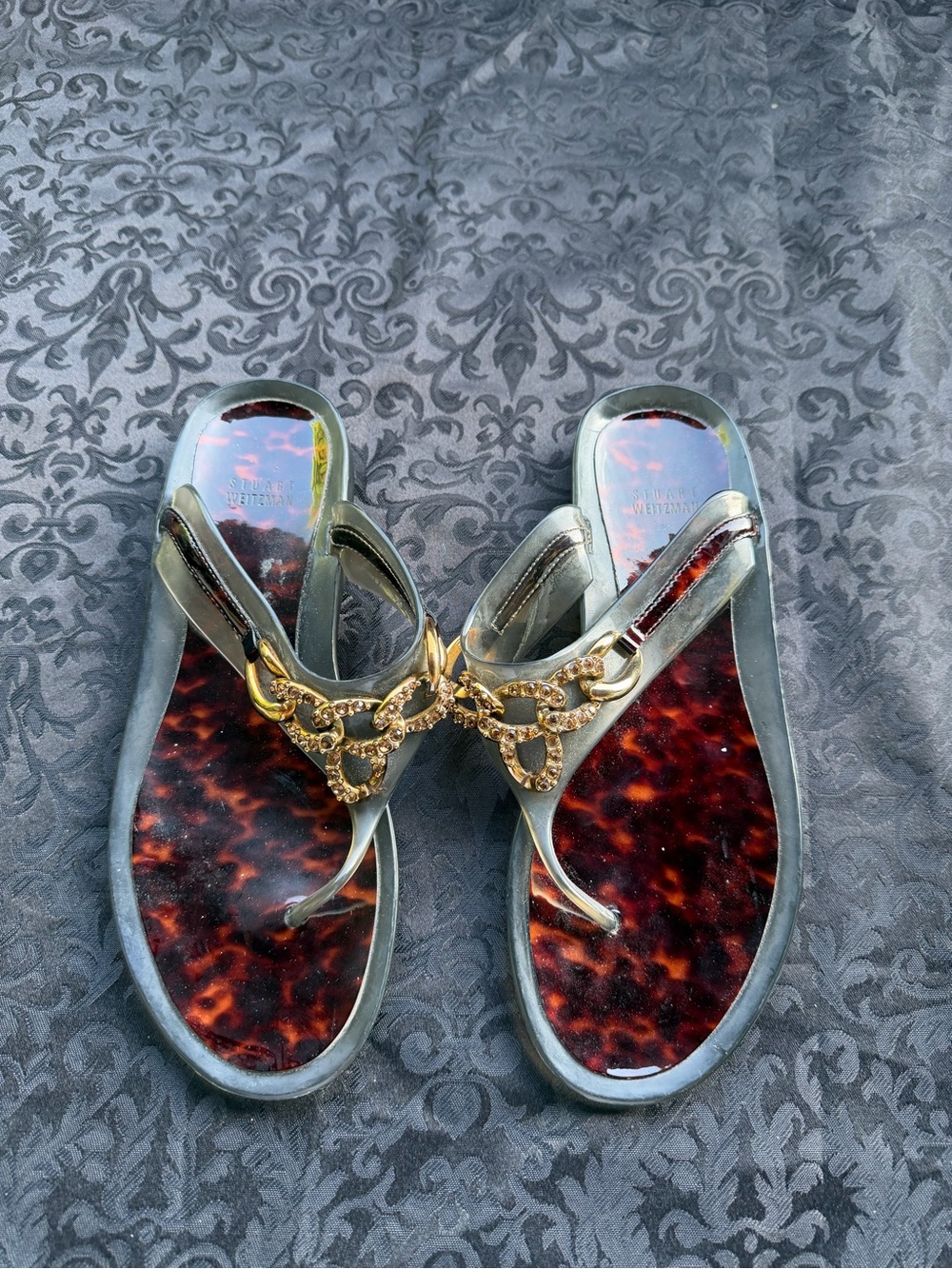 Stuart Weitzman pair of women’s luxury jelly thong sandals. Size 10